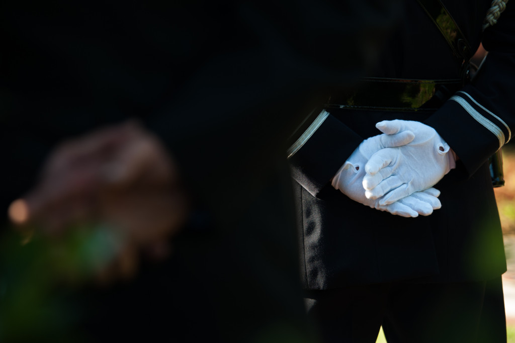 A member of the honor guard folds his hands behind his back during a 9/11 memorial service at the Southern Pines Fire Department on Friday, September 11, 2015 in Southern Pines. Community Public safety members and an audience gathered in remembrance of the 14-year-anniversary of the tragedy which took place on September 11, 2001 in New York City.