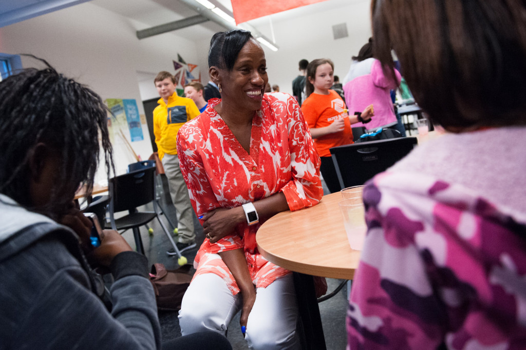 Olympian Jackie Joyner-Kersee shakes speaks with kids during a meet and greet in the Teen Center at the Boys and Girls Club on Thursday, September 24, 2015 in Southern Pines, North Carolina.