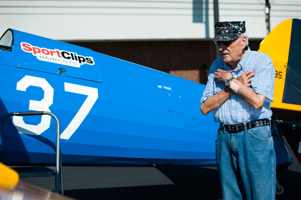 Larry Deister makes a joke and crosses his chest before taking his turn in Founder, President and Pilot of Ageless Aviation Darryl Fisher's plane at the Moore County Airport on Tuesday, September 1, 2015 in Whispering Pines.