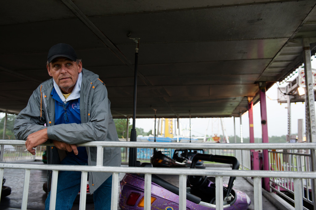 Bumper Car Operator George Wills waits for the gates to open at the Moore County Fair on Thursday, October 1, 2015 in Carthage, North Carolina.