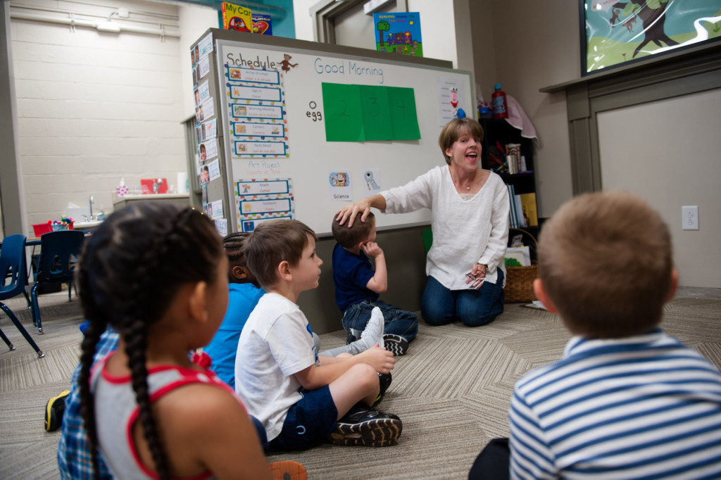 Teacher Julie Pitts speaks to her students as they sit in a circle at HOPE Academy, a recently opened pre-school, on Wednesday, September 16, 2015 in Robbins, North Carolina.