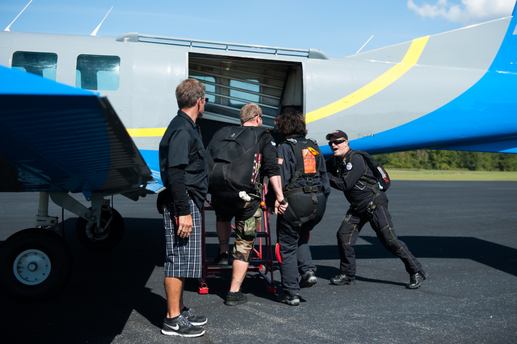 Tandem Instructor Robbie Rushton and Beth Patteron Casilio board their plane at the Raeford Drop Zone on Thursday, October 8, 2015 in Raeford, North Carolina.