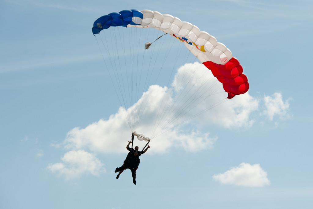 Beth Patterson Casilio and Robbie Rushton are seen in the sky at the Raeford Drop Zone on Thursday, October 8, 2015 in Raeford, North Carolina.