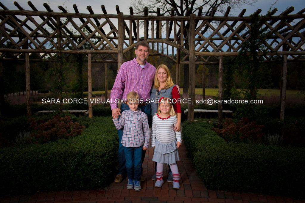 Greg and Lucy Noble stand for family portraits with their children Wesley and Kate at the Pinehurst Arboretum Park on Sunday, November 16, 2015 in Pinehurst, North Carolina.