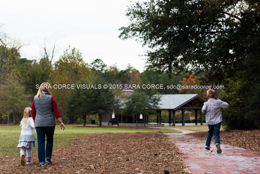 Greg and Lucy Noble stand for family portraits with their children Wesley and Kate at the Pinehurst Arboretum Park on Sunday, November 16, 2015 in Pinehurst, North Carolina.