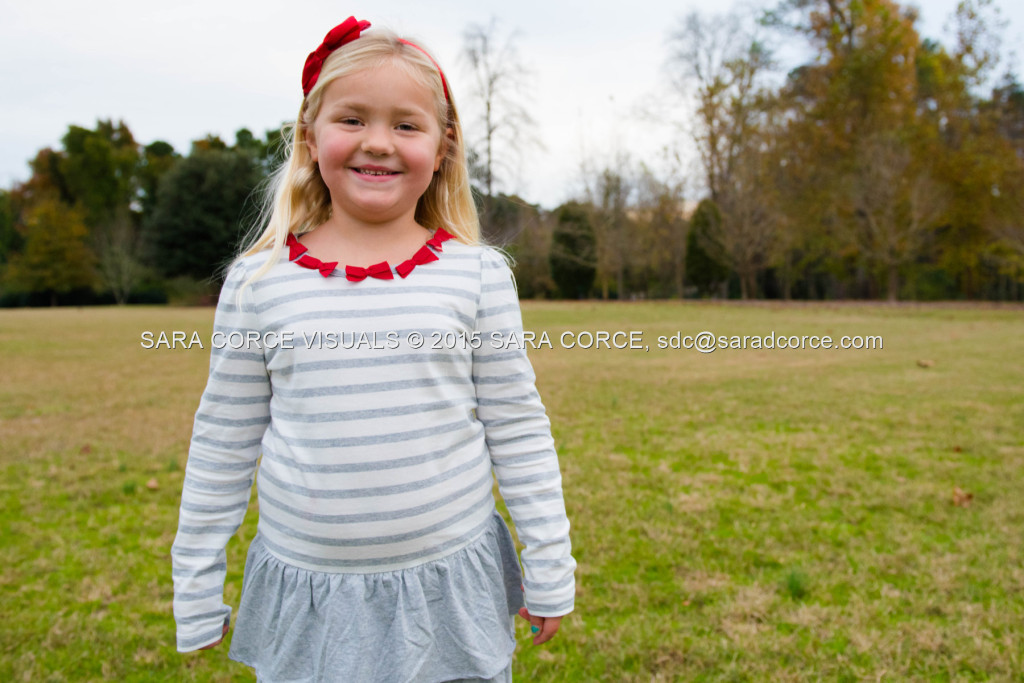 Greg and Lucy Noble stand for family portraits with their children Wesley and Kate at the Pinehurst Arboretum Park on Sunday, November 16, 2015 in Pinehurst, North Carolina.