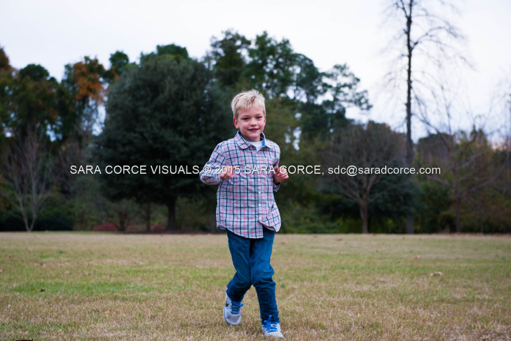 Greg and Lucy Noble stand for family portraits with their children Wesley and Kate at the Pinehurst Arboretum Park on Sunday, November 16, 2015 in Pinehurst, North Carolina.