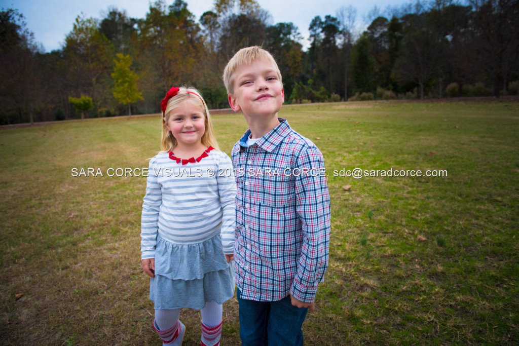 Greg and Lucy Noble stand for family portraits with their children Wesley and Kate at the Pinehurst Arboretum Park on Sunday, November 16, 2015 in Pinehurst, North Carolina.