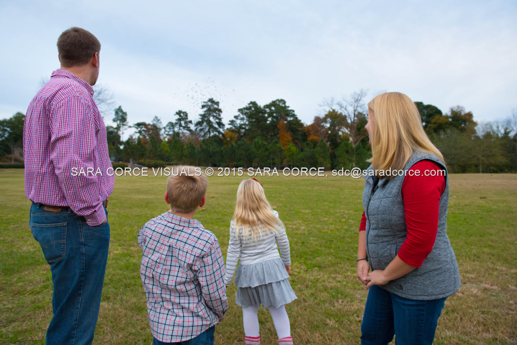 Greg and Lucy Noble stand for family portraits with their children Wesley and Kate at the Pinehurst Arboretum Park on Sunday, November 16, 2015 in Pinehurst, North Carolina.