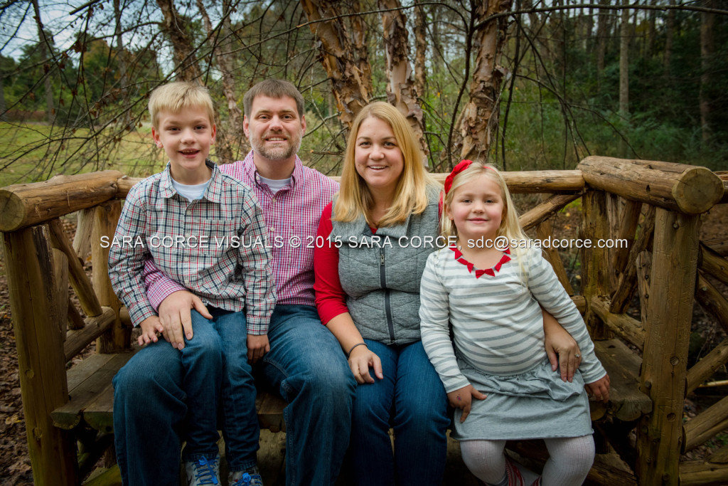 Greg and Lucy Noble stand for family portraits with their children Wesley and Kate at the Pinehurst Arboretum Park on Sunday, November 16, 2015 in Pinehurst, North Carolina.