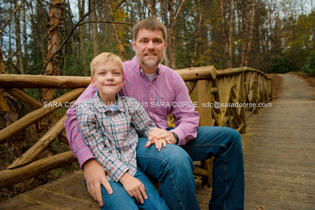 Greg and Lucy Noble stand for family portraits with their children Wesley and Kate at the Pinehurst Arboretum Park on Sunday, November 16, 2015 in Pinehurst, North Carolina.