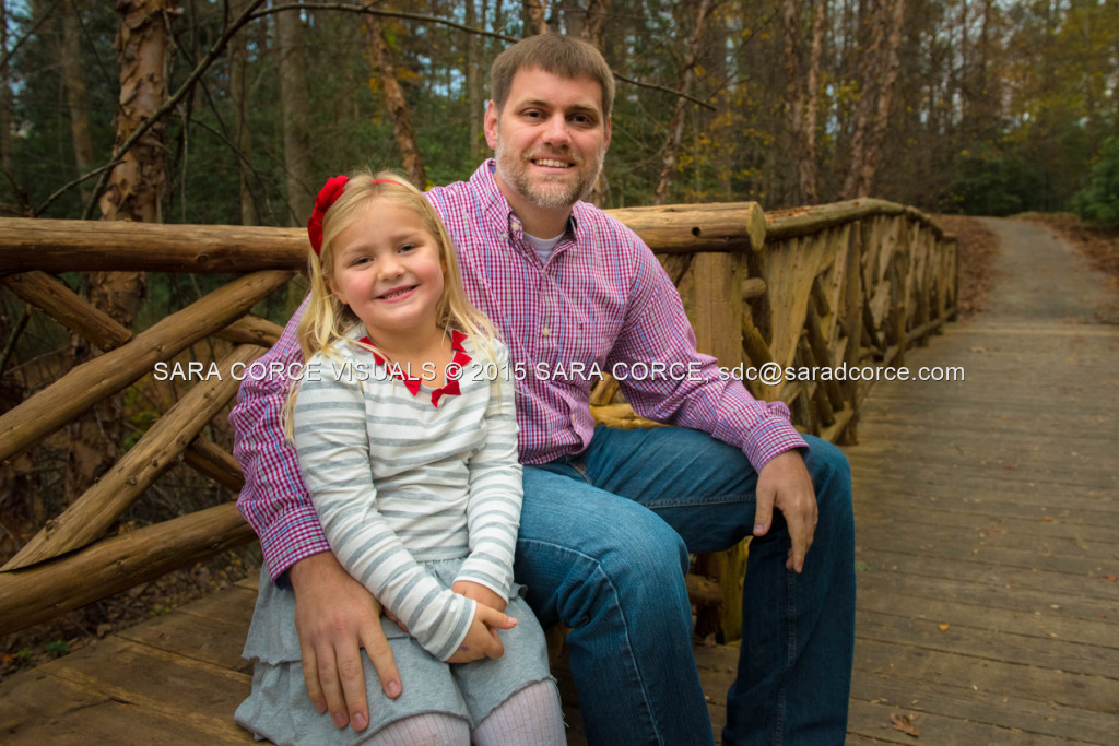 Greg and Lucy Noble stand for family portraits with their children Wesley and Kate at the Pinehurst Arboretum Park on Sunday, November 16, 2015 in Pinehurst, North Carolina.