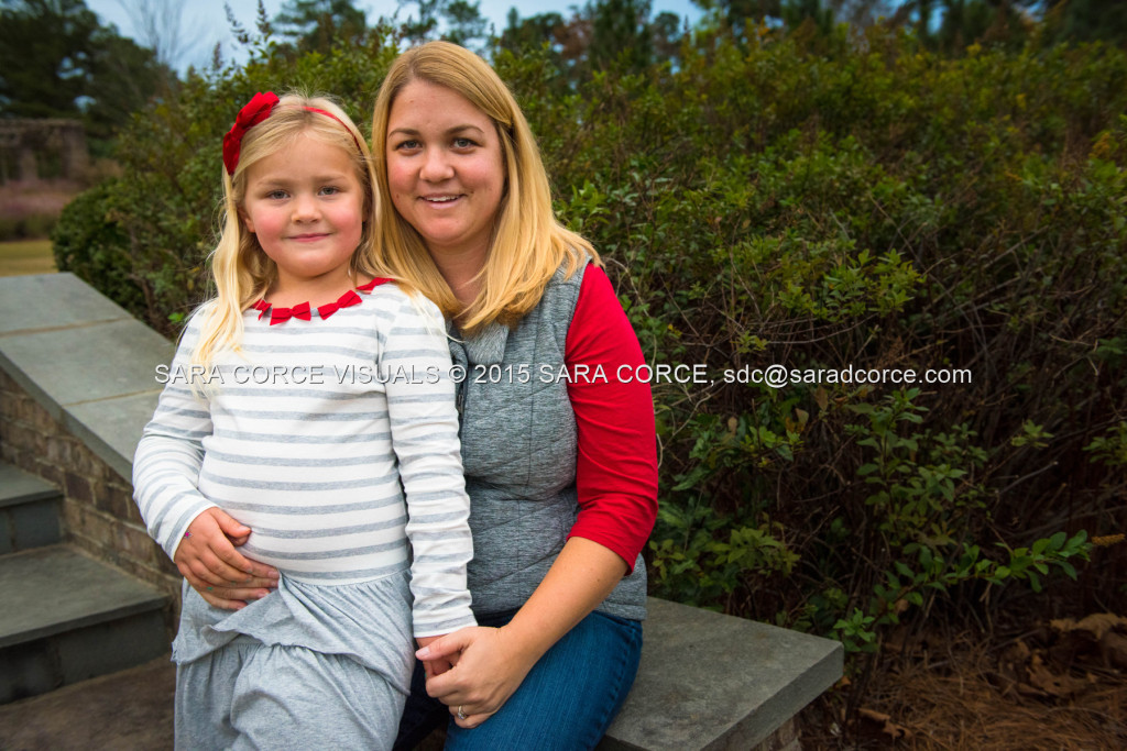 Greg and Lucy Noble stand for family portraits with their children Wesley and Kate at the Pinehurst Arboretum Park on Sunday, November 16, 2015 in Pinehurst, North Carolina.