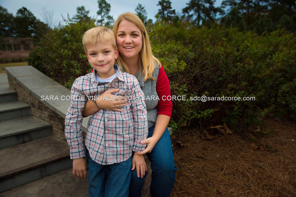 Greg and Lucy Noble stand for family portraits with their children Wesley and Kate at the Pinehurst Arboretum Park on Sunday, November 16, 2015 in Pinehurst, North Carolina.