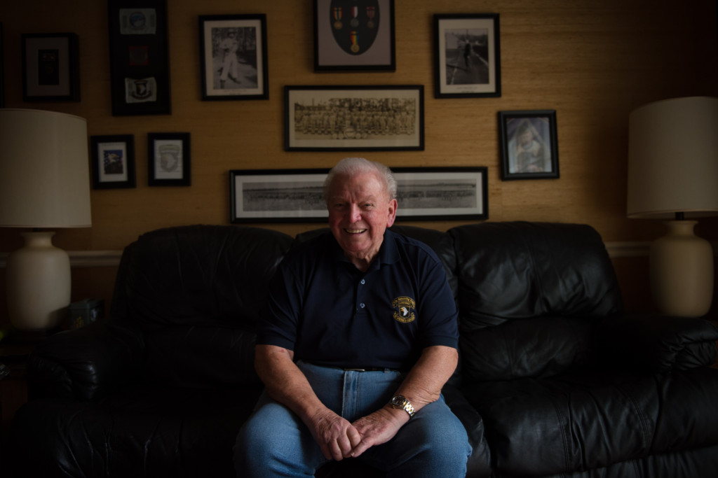 Eugene C. Deibler, 91-years-old, of Pinehurst, sits for a portrait in his "war room" den on Wednesday, November 18, 2015 in Pinehurst, North Carolina. Deibler received the Legion of Honor Medal for his efforts in the liberation of France from German occupation in World War II as a paratrooper with the 101st Airborne. The National Order of the Legion of Honor is the highest award given by France, which also grants its recipient the honorable distinction of knighthood.