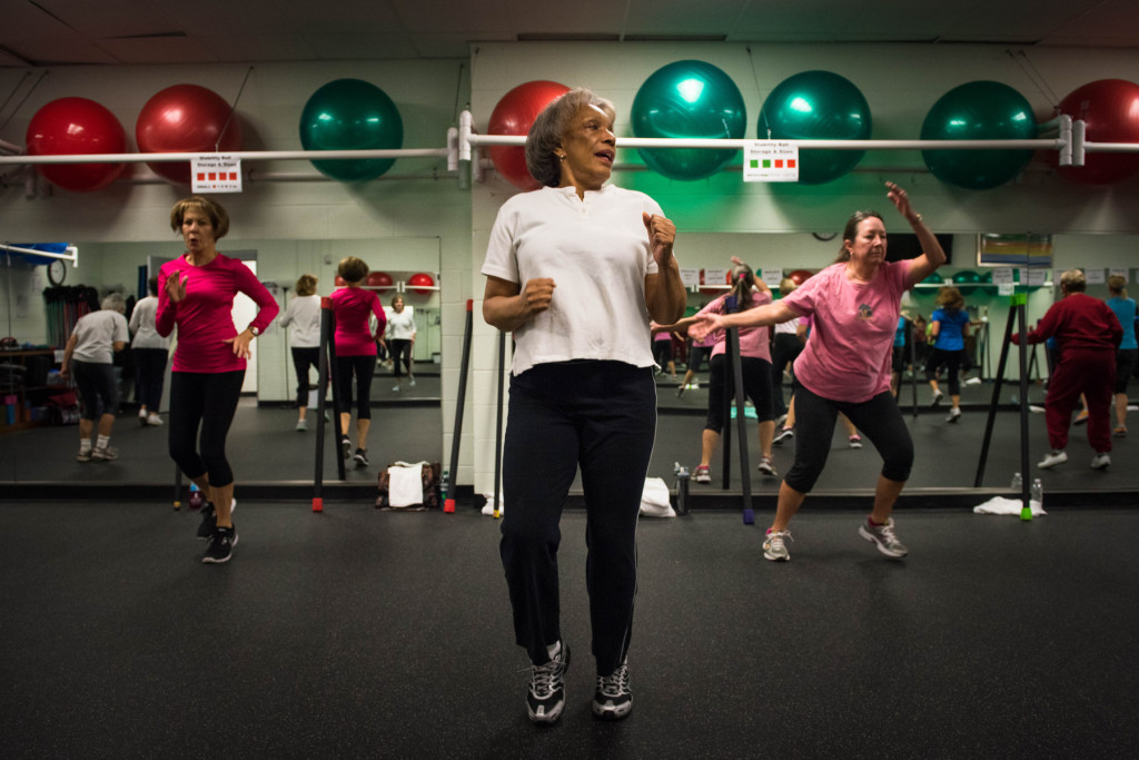 Queen Steele (center) participates during a Tabata class at the Senior Enrichment Center on Monday, November 23, 2015 near West End, North Carolina.