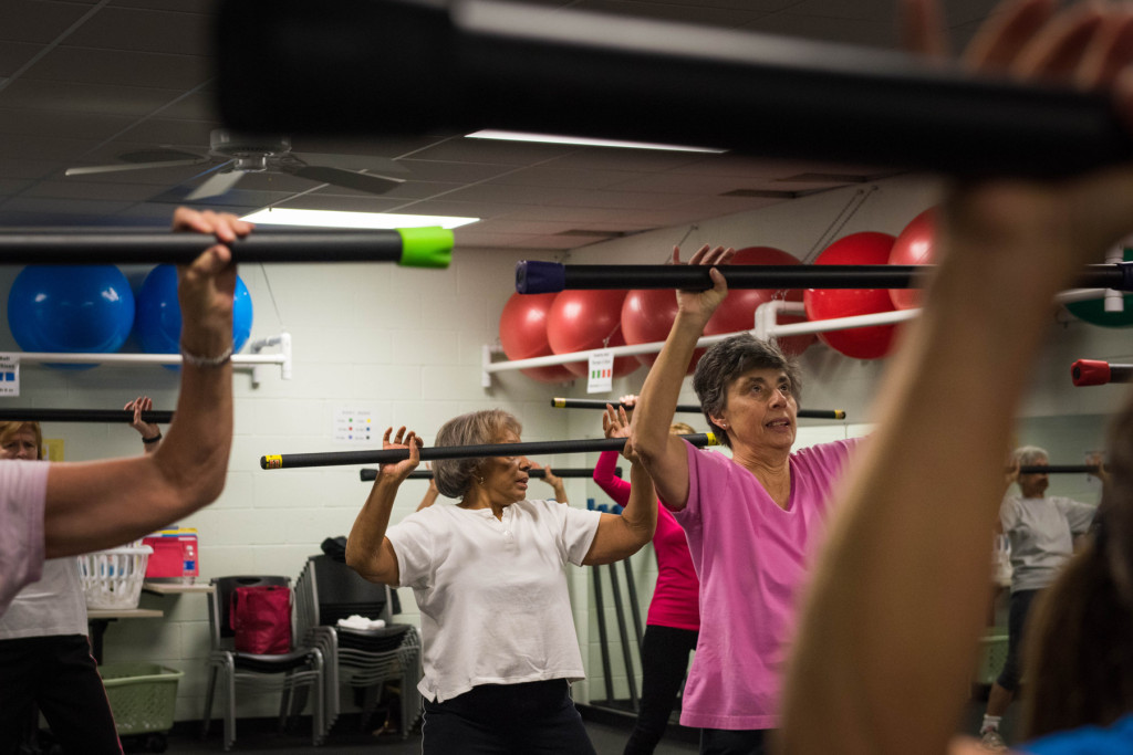 Queen Steele (center) participates, along with other classmates, during a Tabata class at the Senior Enrichment Center on Monday, November 23, 2015 near West End, North Carolina.