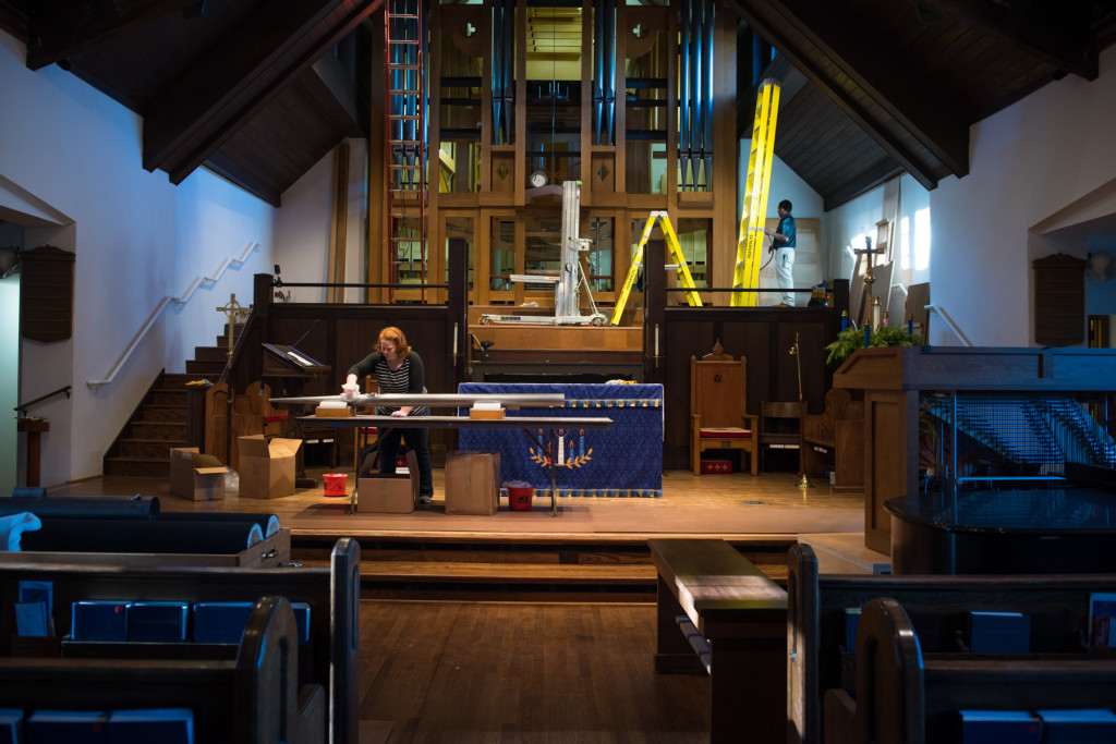 Pipe maker Kate Harrington polishes a pipe as she helps complete the build of a new mechanical-action organ at Emmanuel Episcopal Church on Tuesday, December 15, 2015 in Southern Pines, North Carolina.