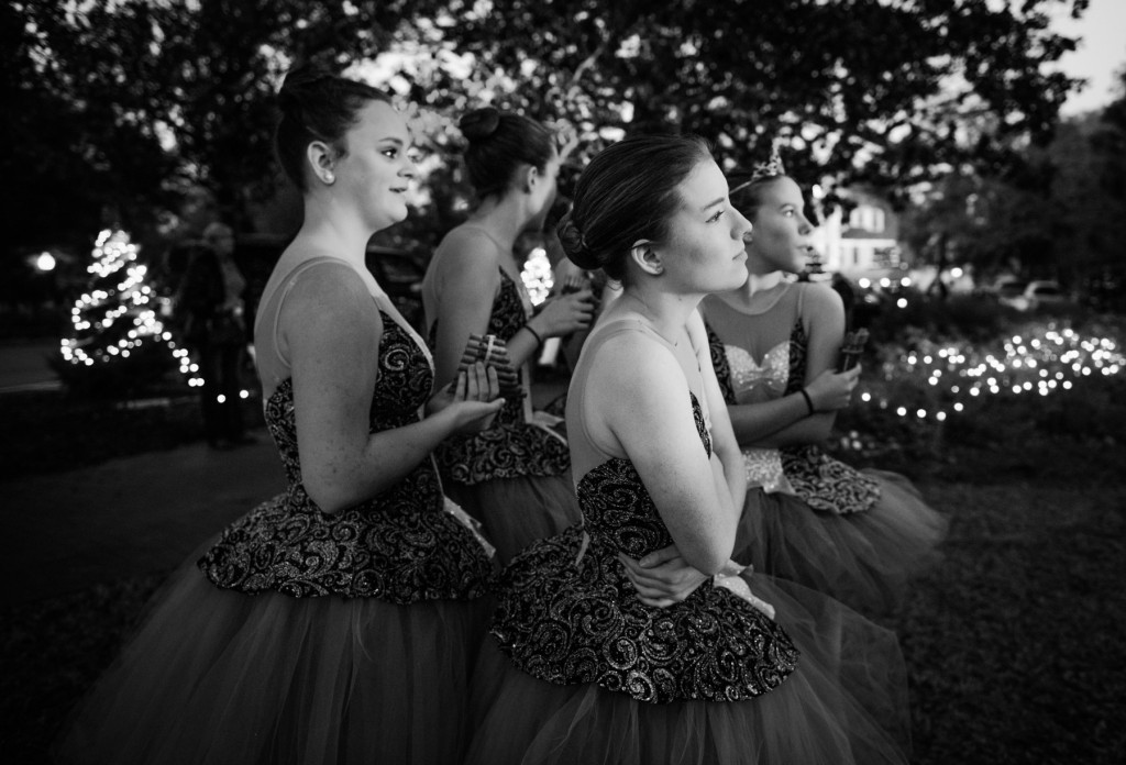 Ballerinas with Terpsichore Dance Studio shiver together as they wait to perform during the Pinehurst Christmas Tree Lighting event, which took place at the Village Lawn in downtown Pinehurst on Friday, December 4, 2015 in Pinehurst, North Carolina.