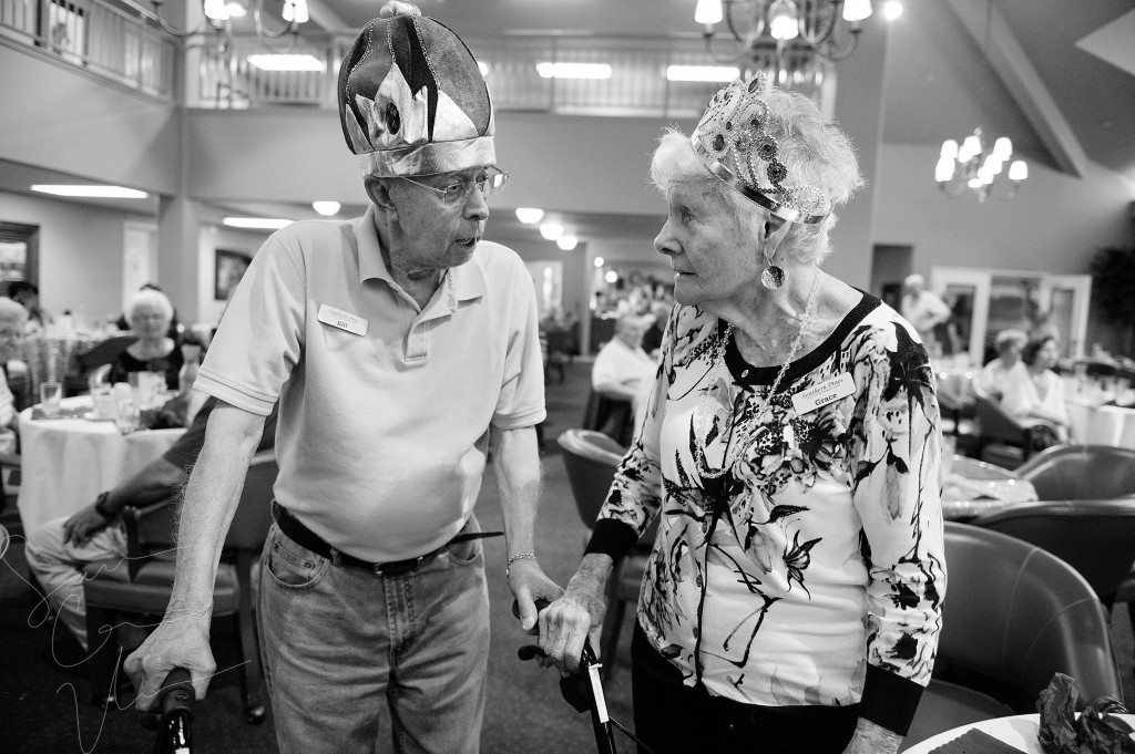 Resident Prom King Bill Valgas speaks with Resident Prom Queen Grace McDonald after they were announced during the Senior Prom event at the Southern Pines Gracious Retirement Living community on Thursday, May 28, 2015 in Southern Pines, North Carolina.