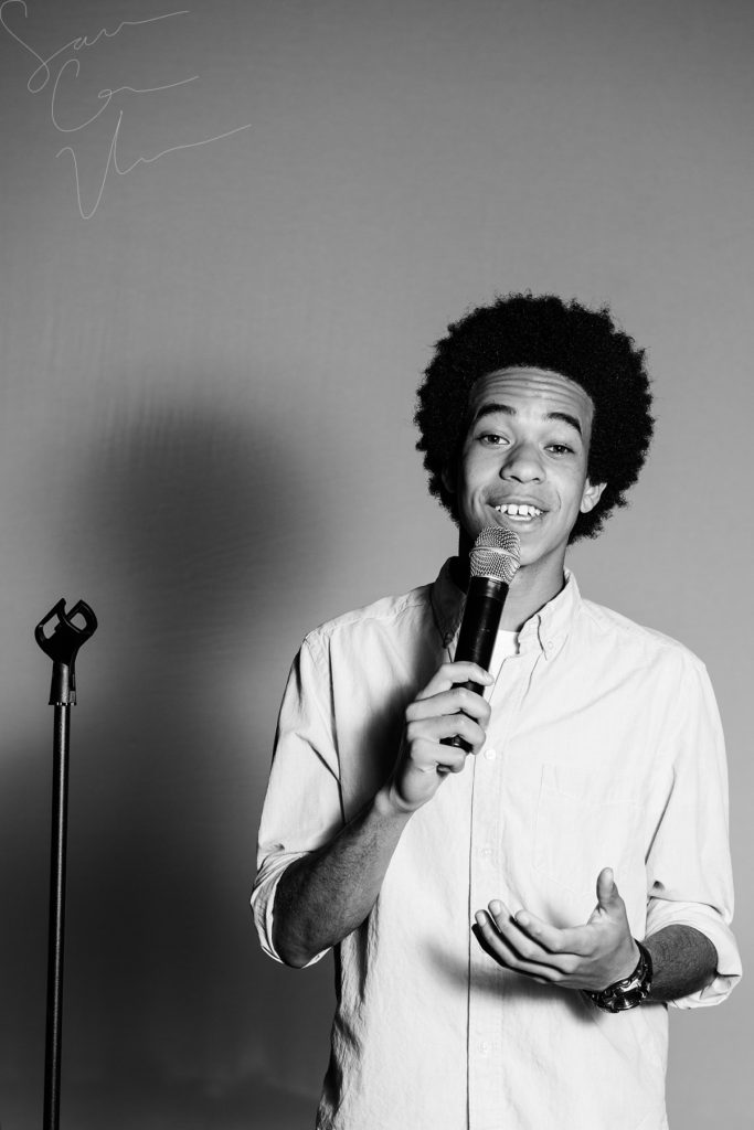 SARA CORCE/Sara Corce Visuals Caleb Elliott stands on stage, going through bits of a comedic routine, for headshots and portraits on Tuesday, April 26, 2016 in Southern Pines, North Carolina. WEBSITE BW