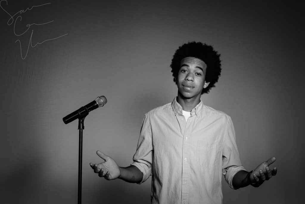 SARA CORCE/Sara Corce Visuals Caleb Elliott stands on stage, going through bits of a comedic routine, for headshots and portraits on Tuesday, April 26, 2016 in Southern Pines, North Carolina. WEBSITE BW