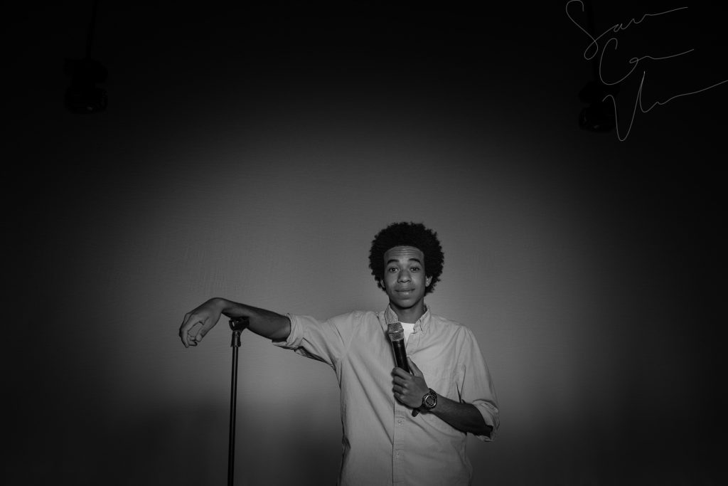 SARA CORCE/Sara Corce Visuals Caleb Elliott stands on stage, going through bits of a comedic routine, for headshots and portraits on Tuesday, April 26, 2016 in Southern Pines, North Carolina. WEBSITE BW