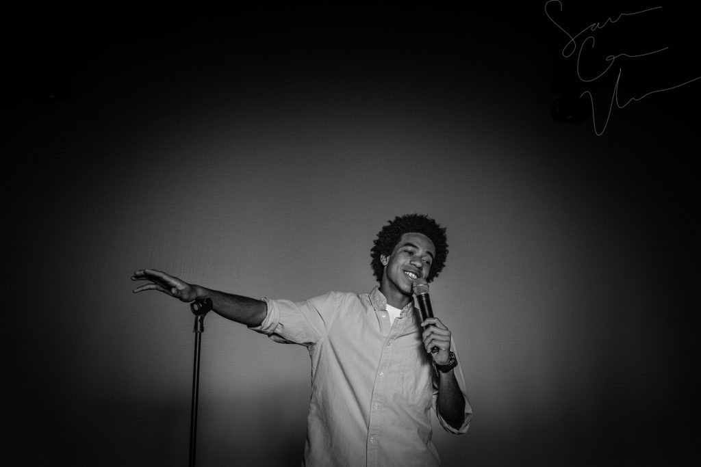 SARA CORCE/Sara Corce Visuals Caleb Elliott stands on stage, going through bits of a comedic routine, for headshots and portraits on Tuesday, April 26, 2016 in Southern Pines, North Carolina. WEBSITE BW