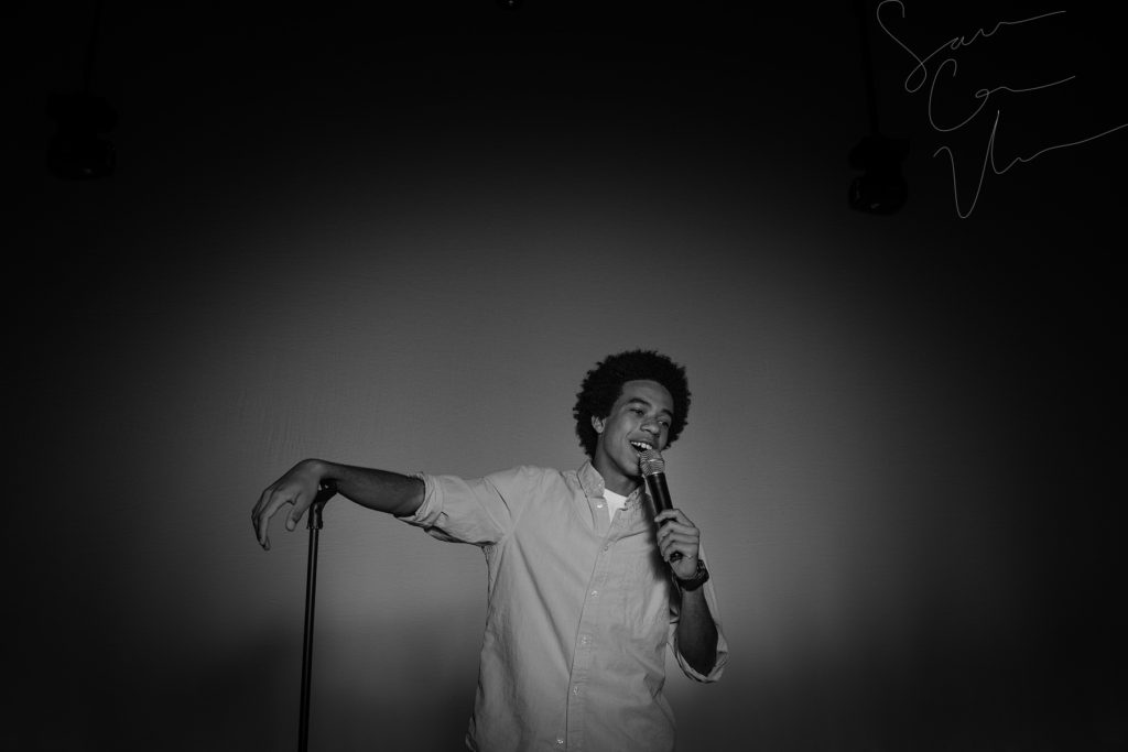 SARA CORCE/Sara Corce Visuals Caleb Elliott stands on stage, going through bits of a comedic routine, for headshots and portraits on Tuesday, April 26, 2016 in Southern Pines, North Carolina. WEBSITE BW