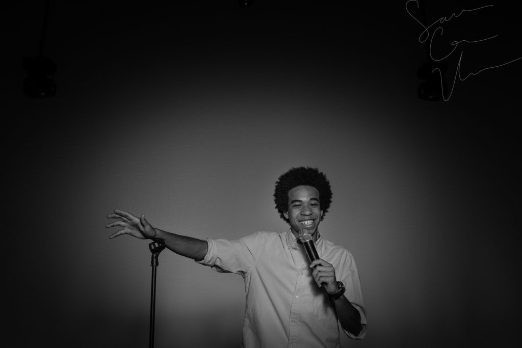 SARA CORCE/Sara Corce Visuals Caleb Elliott stands on stage, going through bits of a comedic routine, for headshots and portraits on Tuesday, April 26, 2016 in Southern Pines, North Carolina. WEBSITE BW